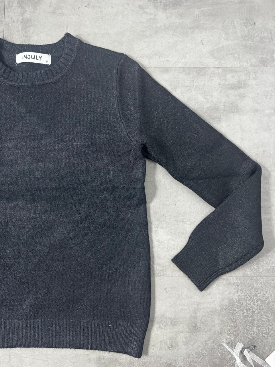 Maglioncino in maglia nero in tinta unita 4-12 anni