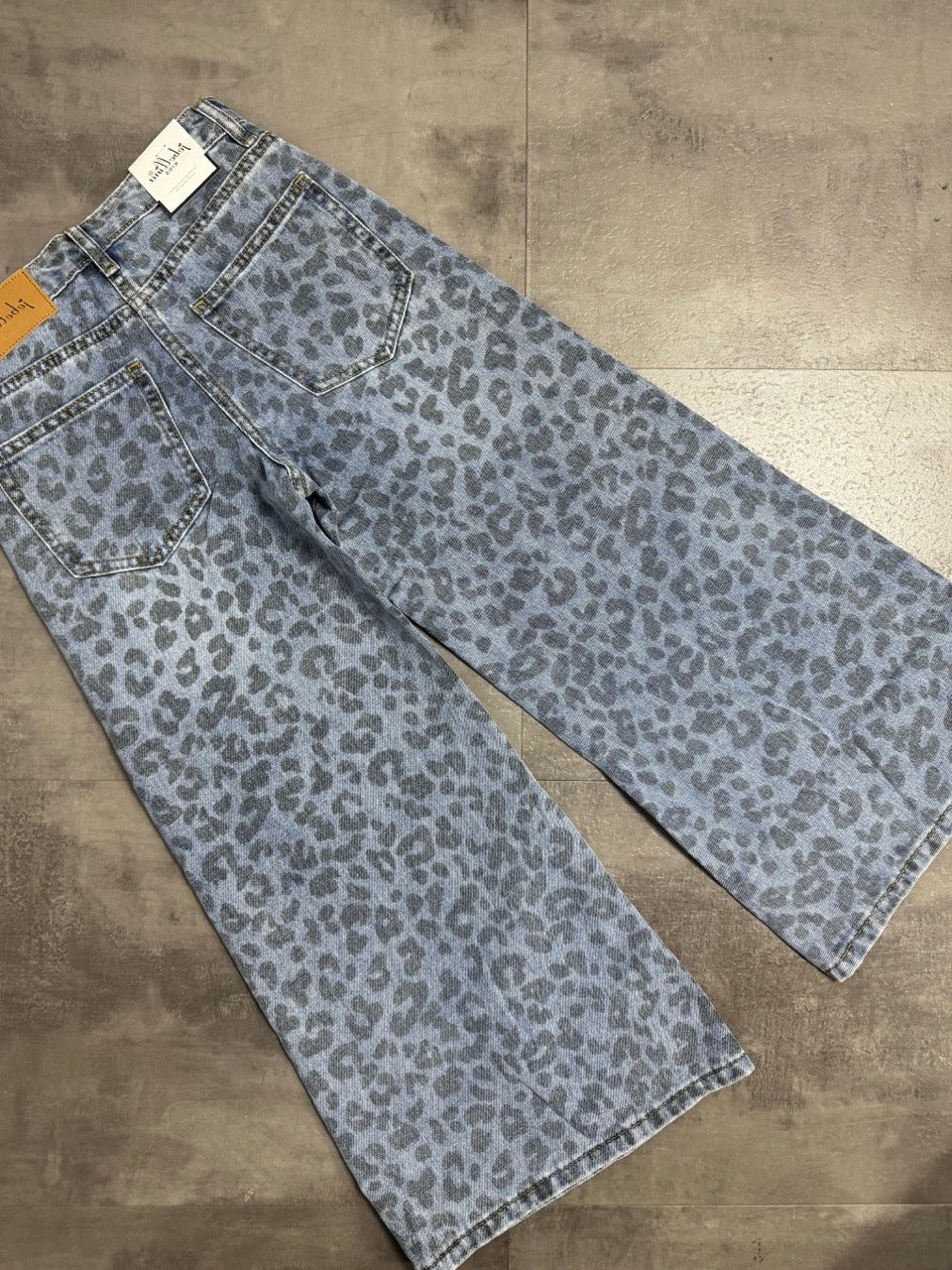 Jeans baggy blu in denim con stampa animalier 6-14 anni