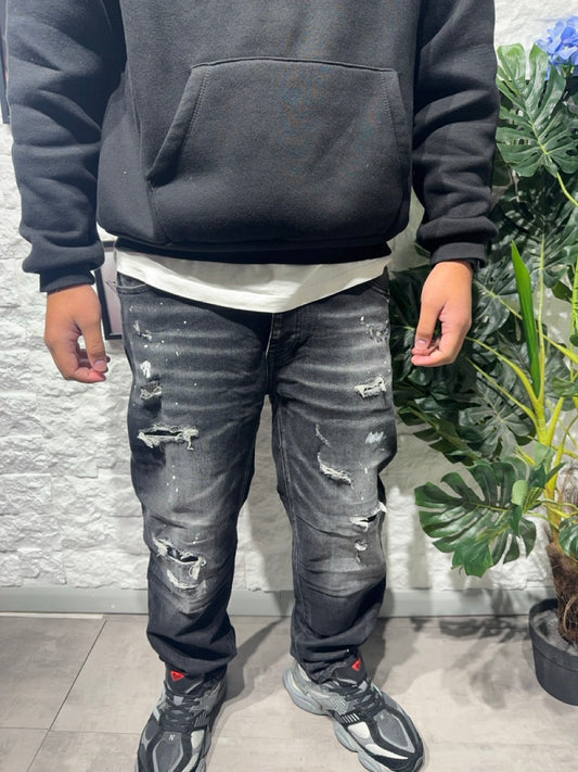 Jeans baggy grigio scuro in denim con schizzi di vernice