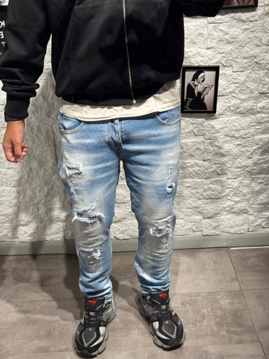 Jeans skinny blu chiaro in denim con strappi