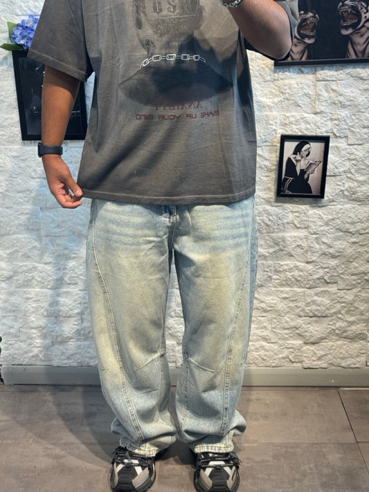 Jeans balloon sabbiato chiaro in denim slavato con cuciture frontali