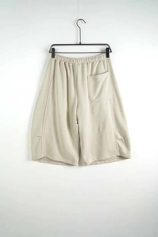 Bermuda uomo beige balloon fit in tinta unita