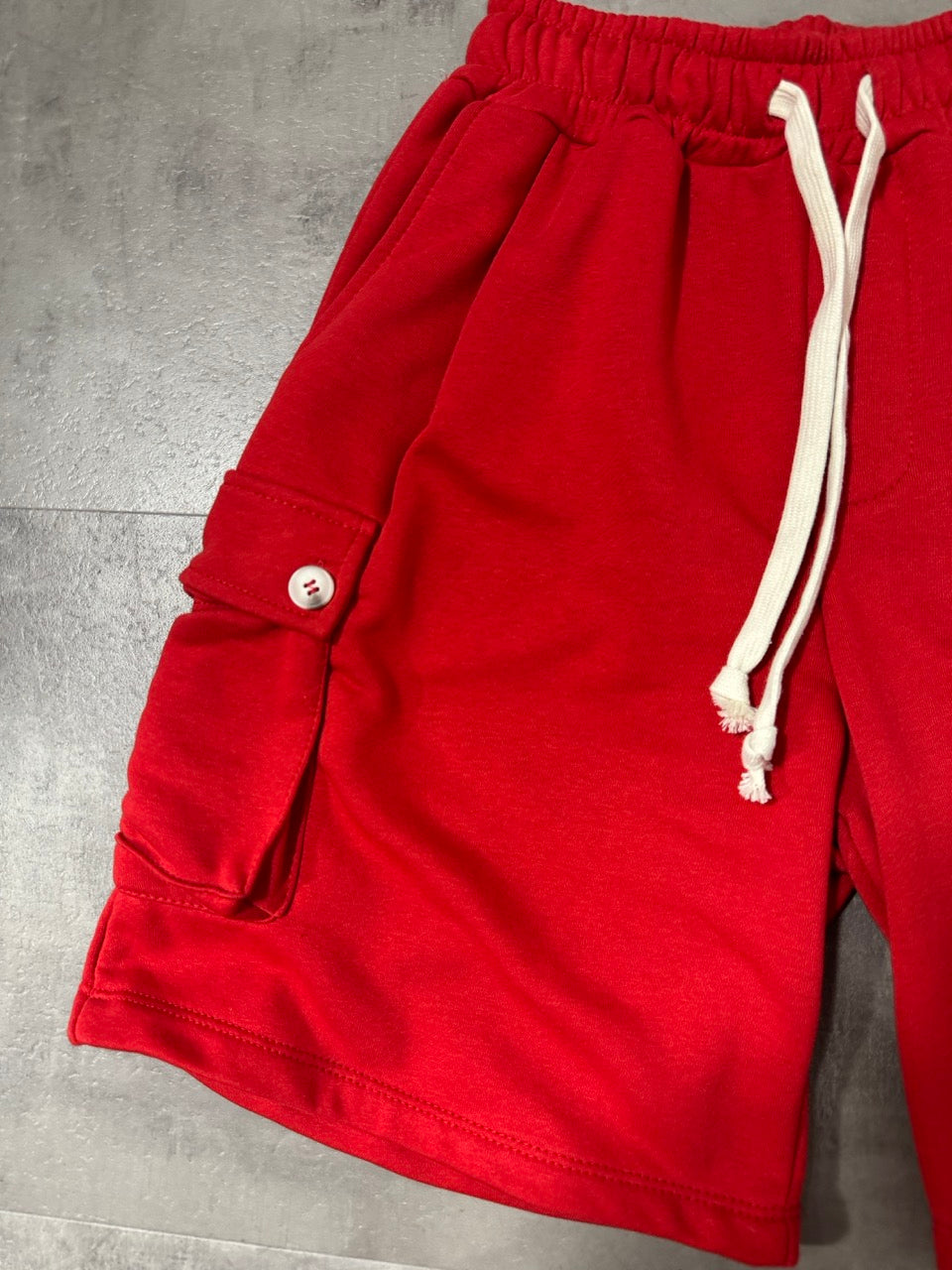 Pantaloncino cargo rosso in cotone con tasche laterali 10-16 anni
