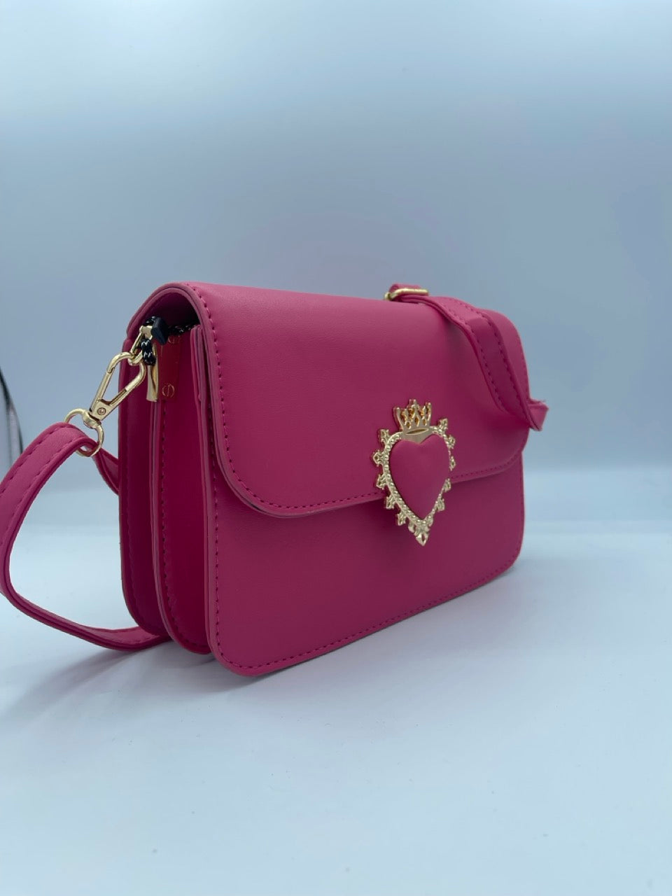 Borsa fucsia in ecopelle con cuore dorato