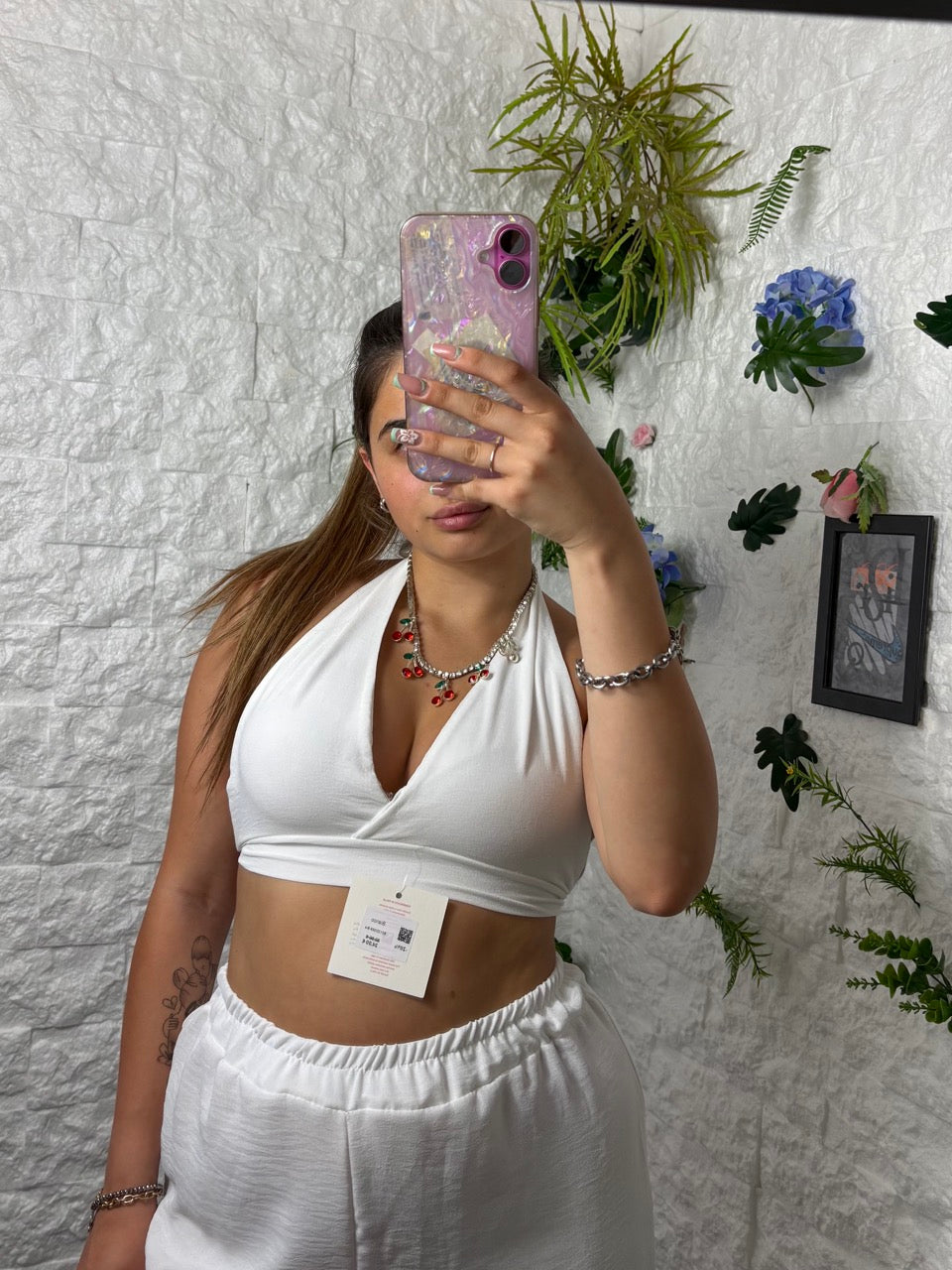 Completo in simil lino con top a triangolo e pantalone a palazzo