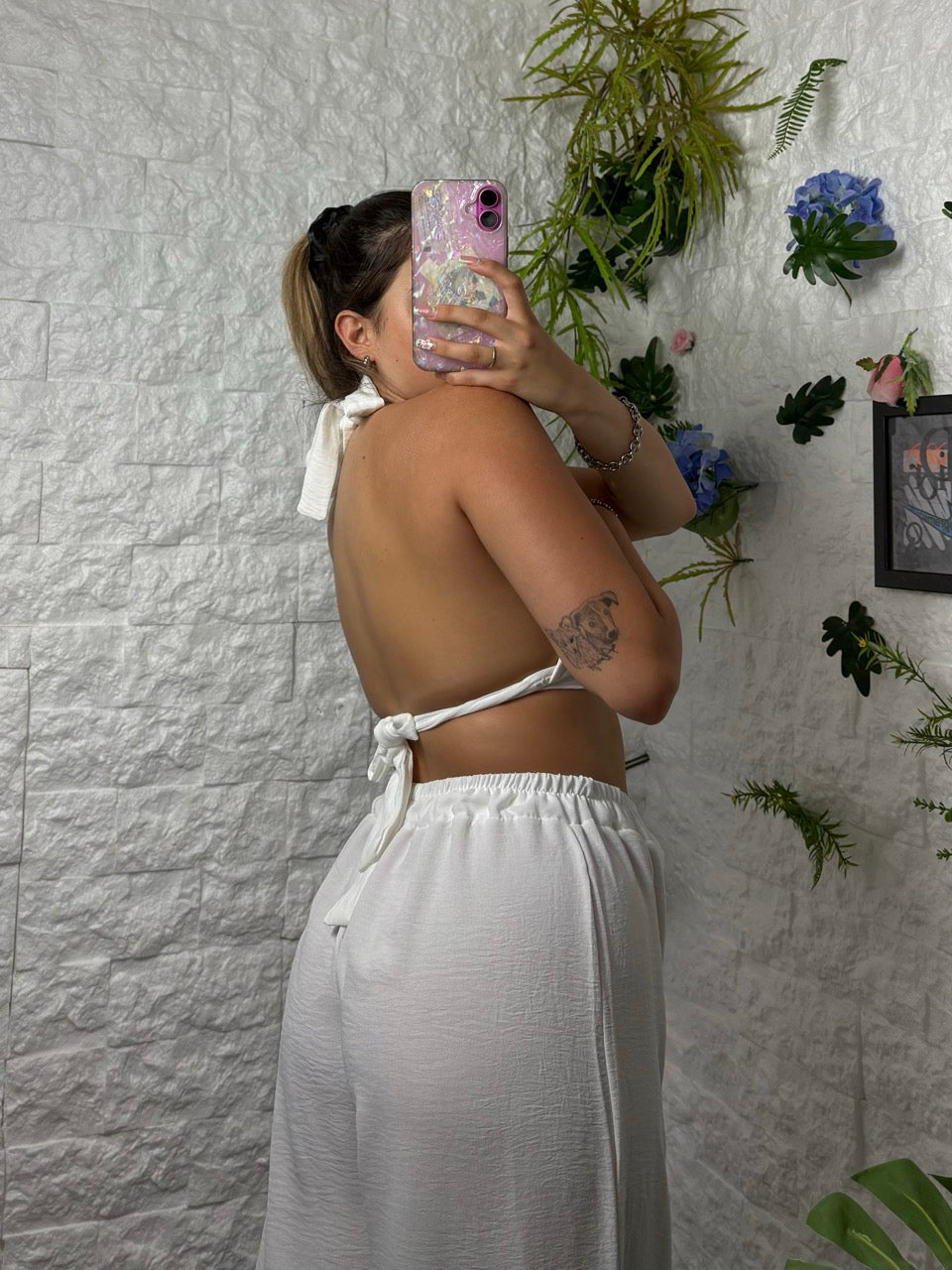 Completo in simil lino con top a triangolo e pantalone a palazzo