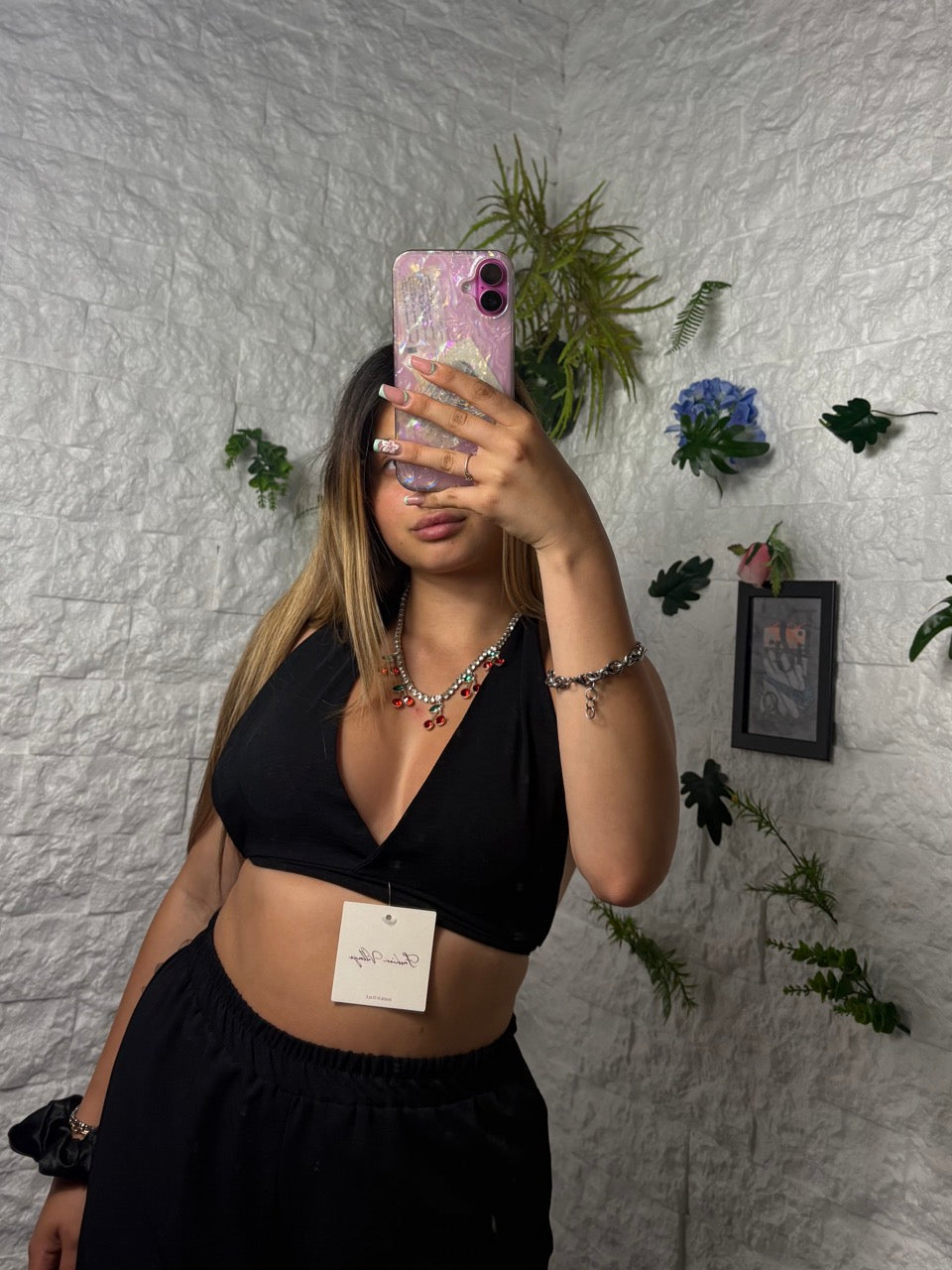 Completo in simil lino con top a triangolo e pantalone a palazzo