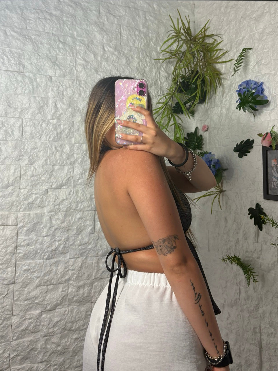 Top in lurex con scollo profondo e schiena scoperta