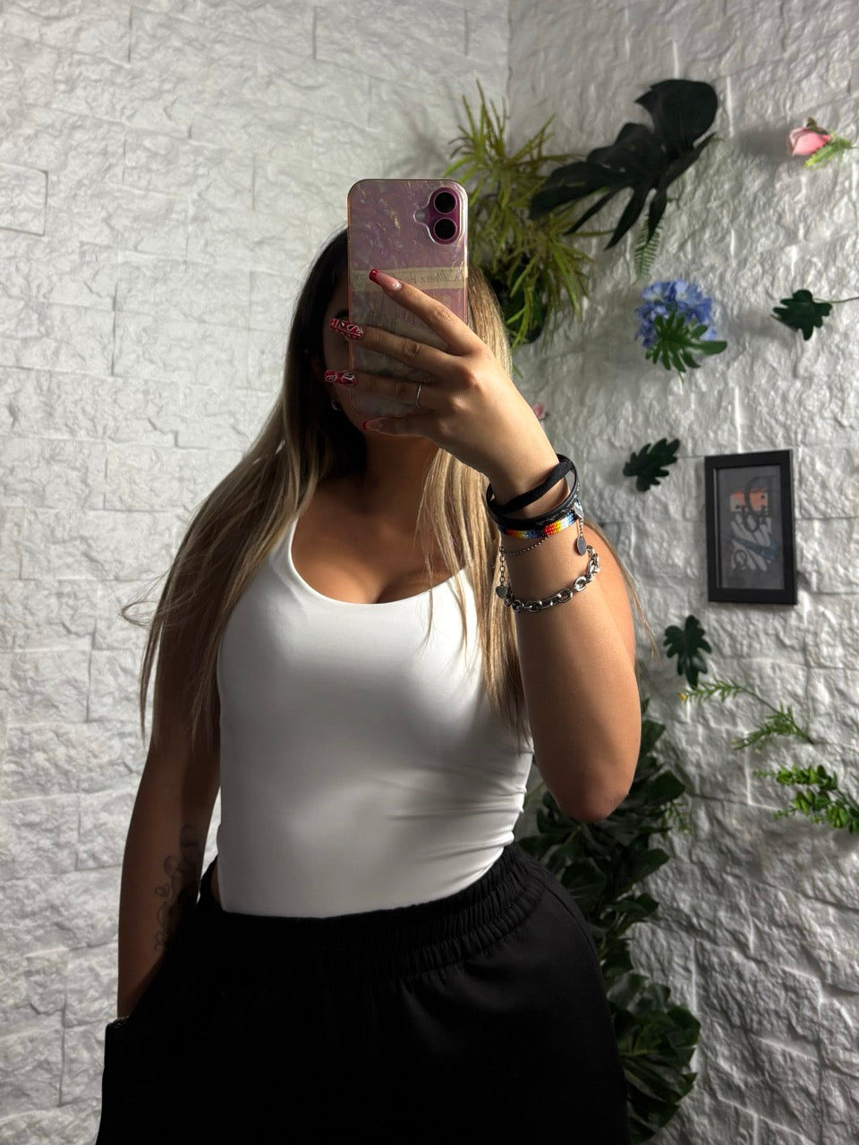 Body in tinta unita con bretelle sottili