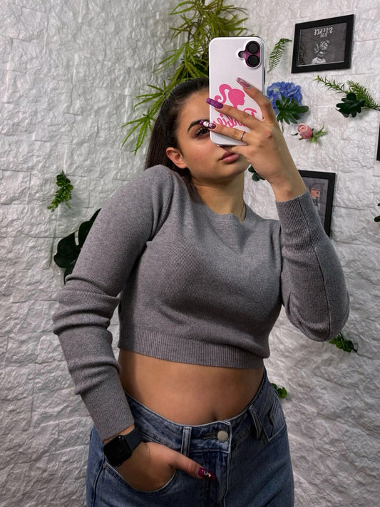 Maglioncino crop-top a costine in tinta unita