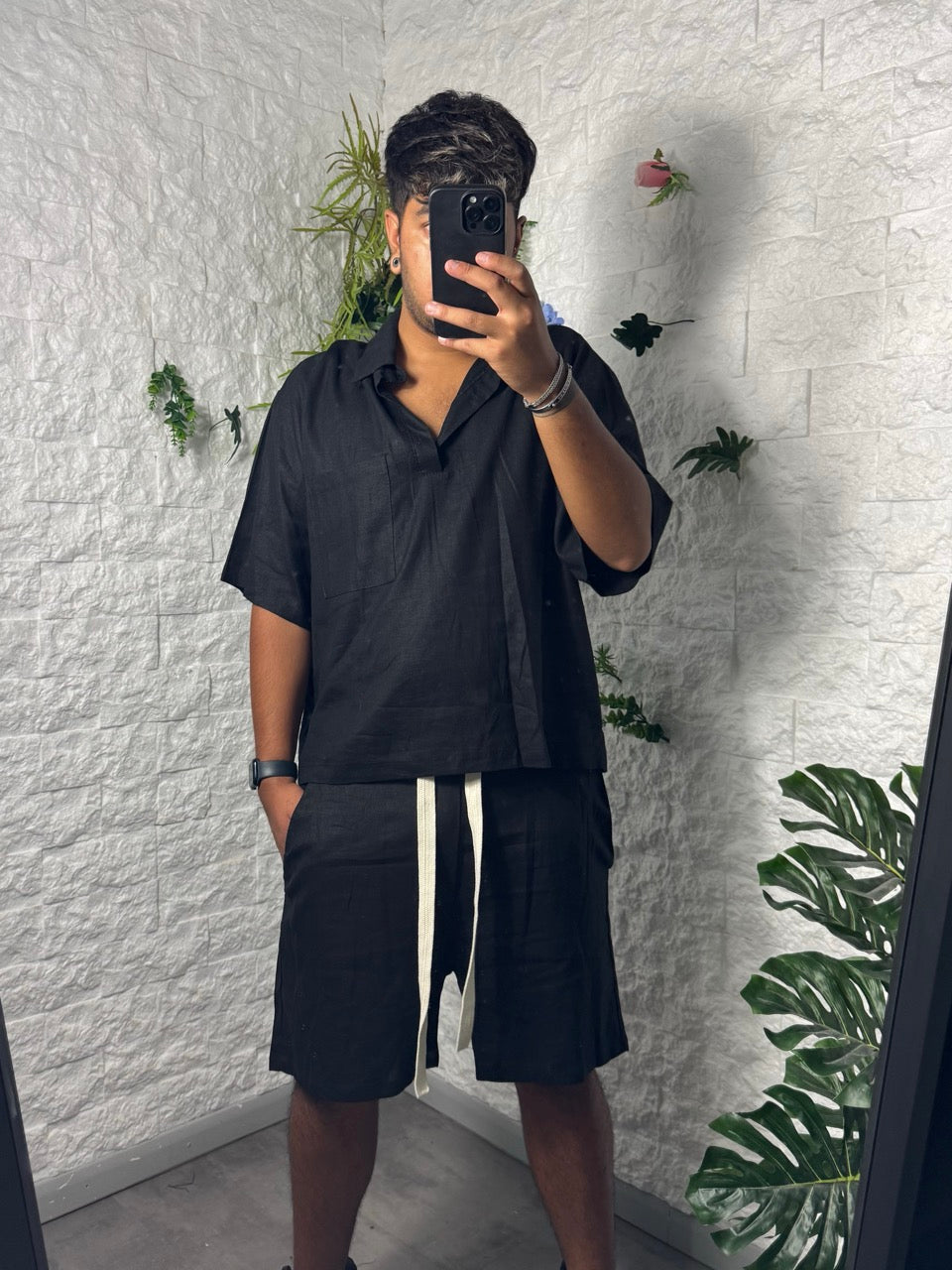 Completo nero in simil lino con polo e pantaloncino coordinato