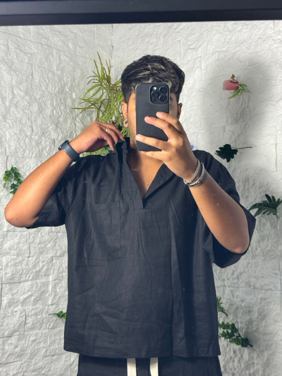 Completo nero in simil lino con polo e pantaloncino coordinato