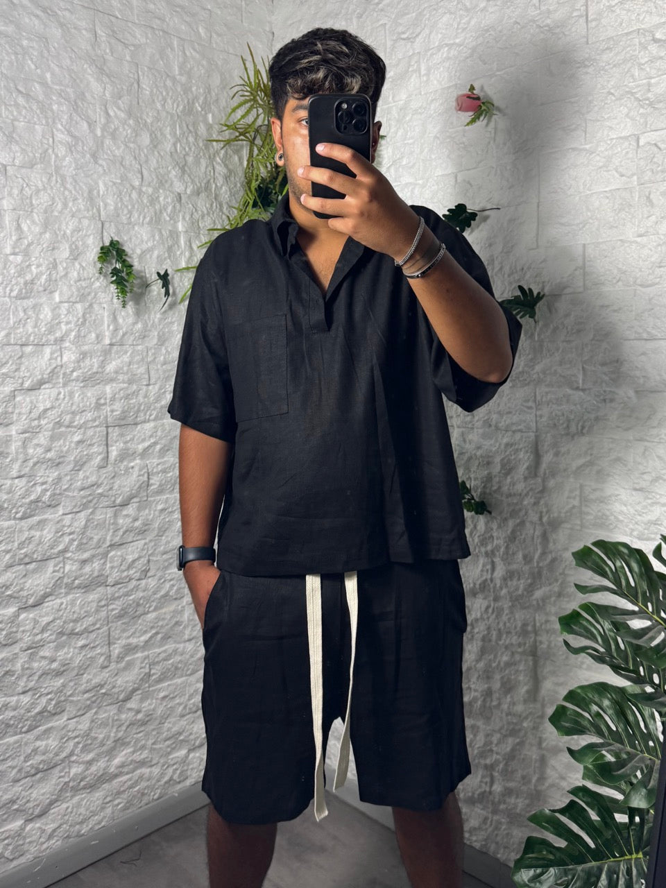 Completo nero in simil lino con polo e pantaloncino coordinato