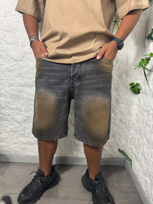 Pantaloncino in denim grigio slavato con effetto ruggine