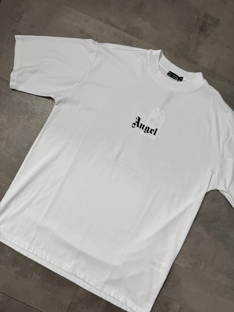 T-shirt bianca con stampa ali e scritta "ANGEL" - OVERSIZE