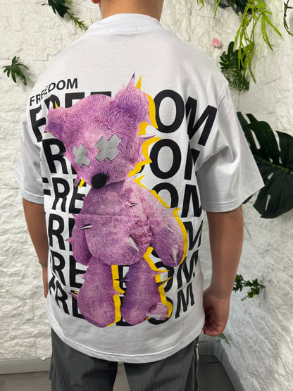 T-shirt bianca con scritta "FREEDOM" e orso viola 10-16 anni B215