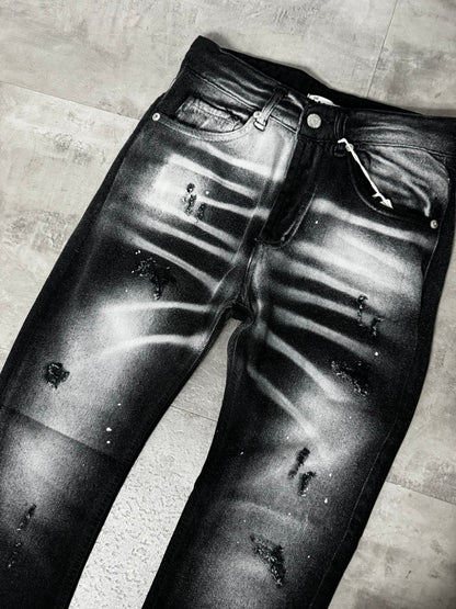 Jeans skinny nero slavato con strappi 10-16 anni