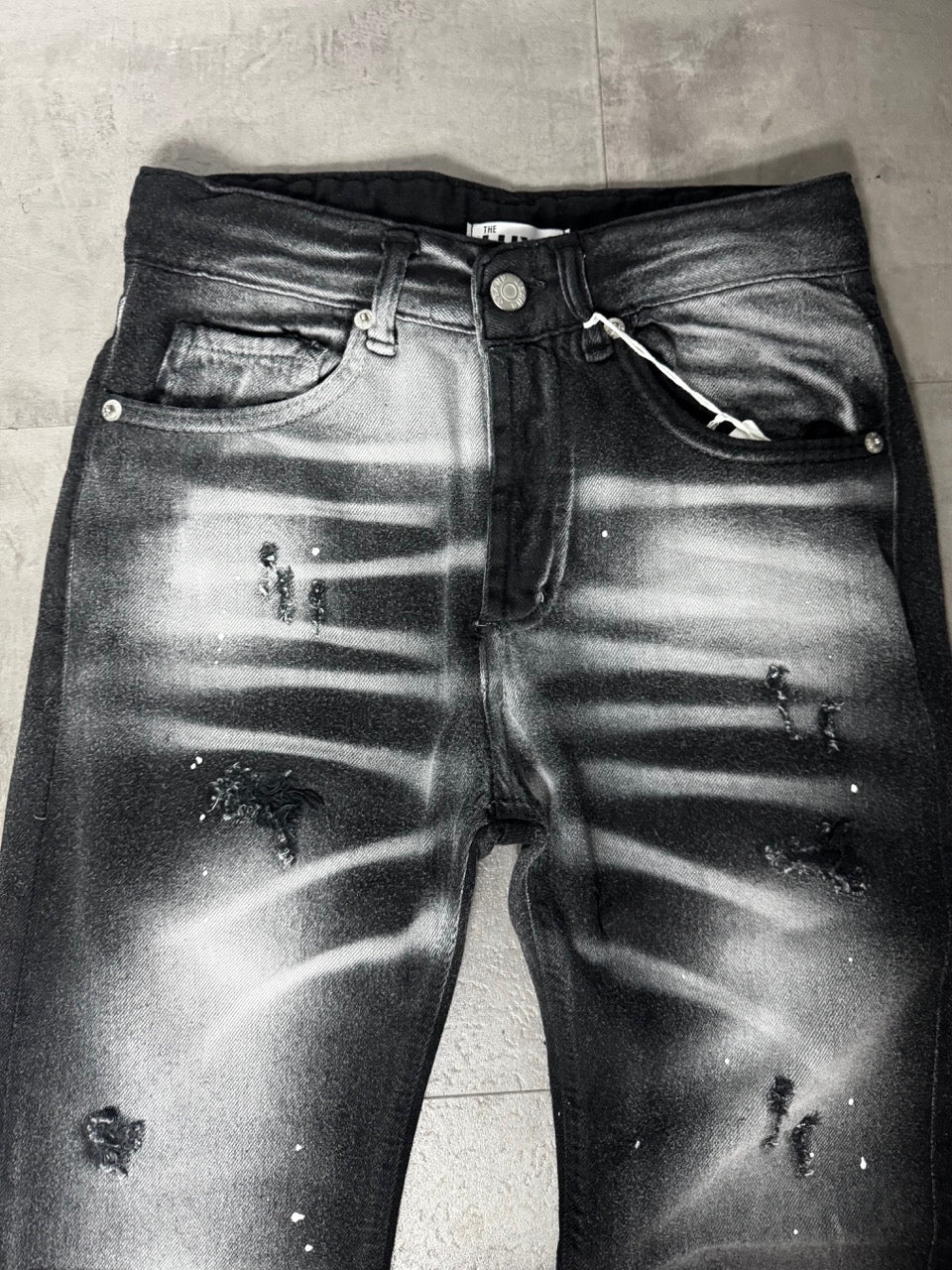 Jeans skinny nero slavato con dettagli strappati 1016 anni