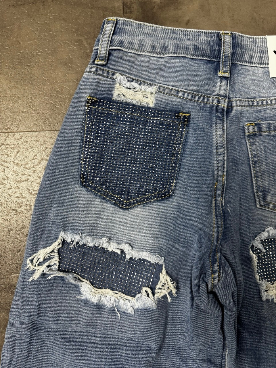 Jeans wide leg blu in denim con strappi e toppe 6-14 anni