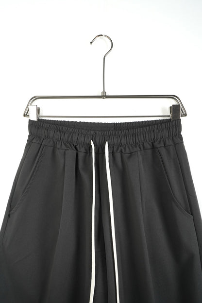 Pantalone nero OVERSIZE con vita elasticizzata e laccio