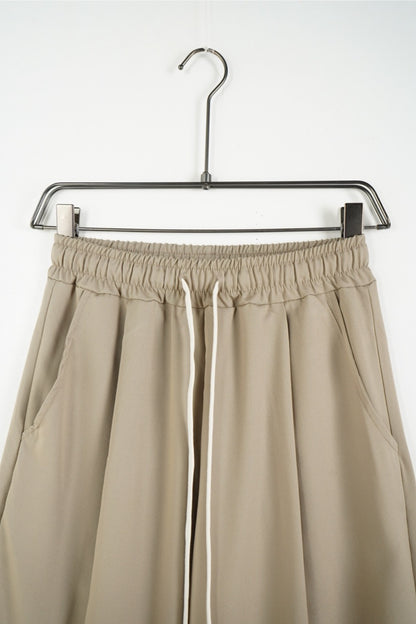 Pantalone beige OVERSIZE con vita elasticizzata e laccio