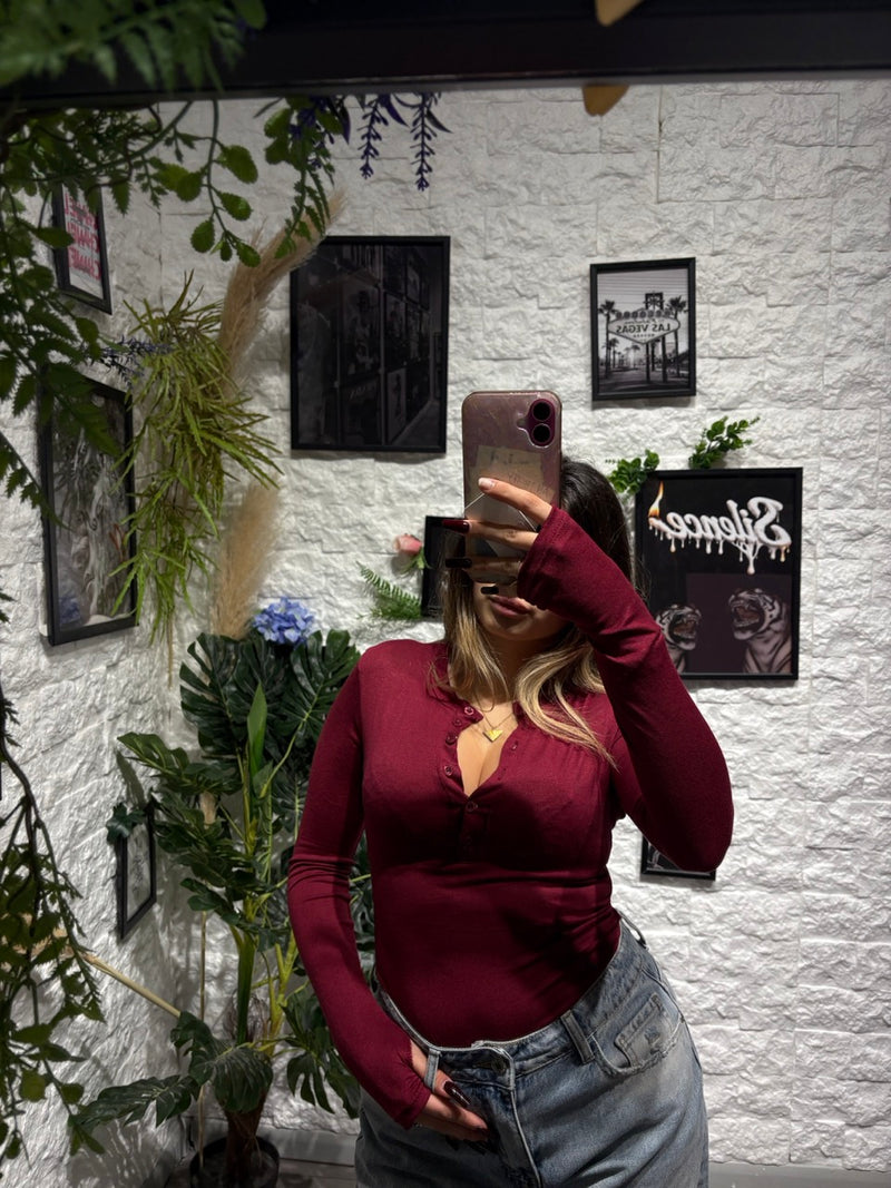 Body leggero in tinta unita con scollo polo e maniche a guanto