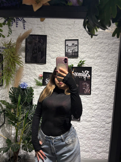 Body tinta unita a manica lunga con mezzo collo e manica a guanto