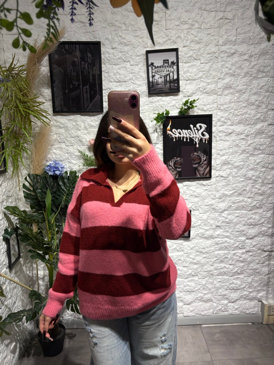 Maglione a righe orizzontali con colletto polo