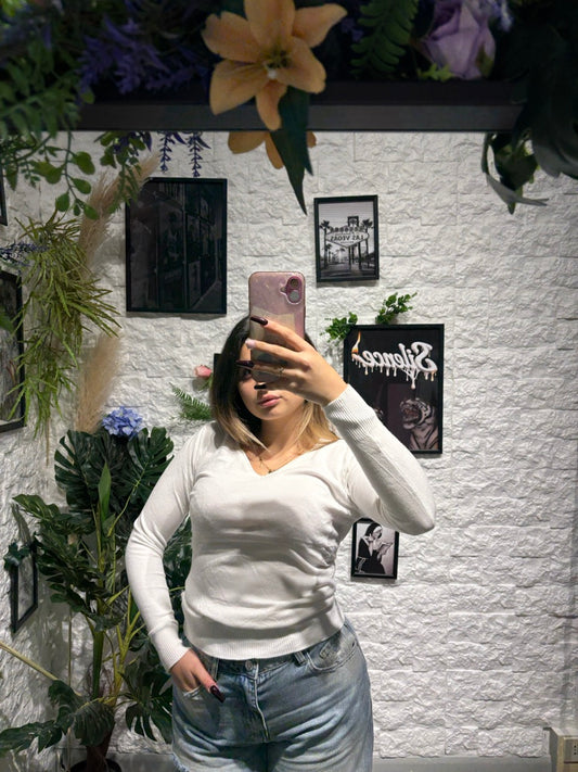 Maglione elasticizzato a tinta unita con scollo a V