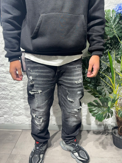 Jeans baggy grigio scuro in denim con schizzi di vernice