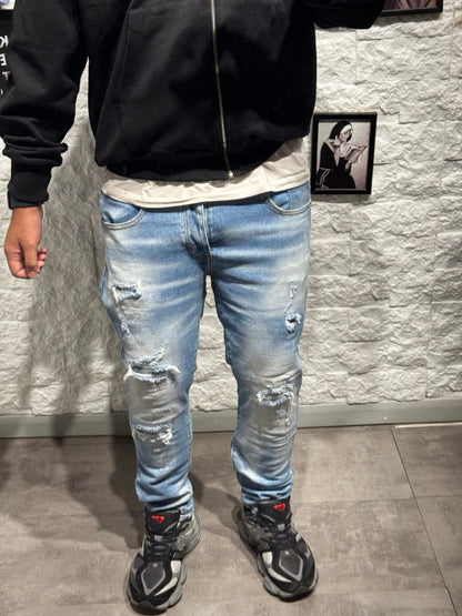 Jeans skinny blu chiaro in denim con strappi