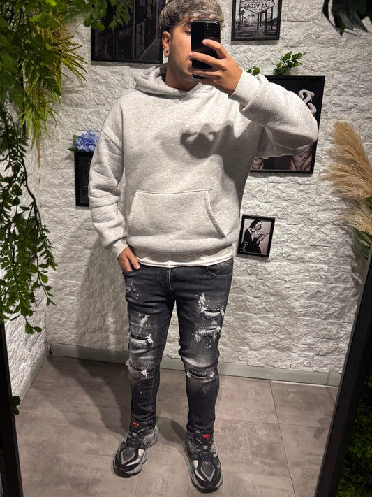 Jeans skinny grigio scuro in denim con schizzi di vernice