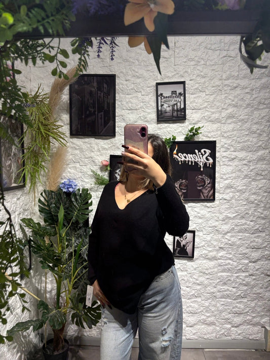 Maglione in maglia a tinta unita con scollo a V