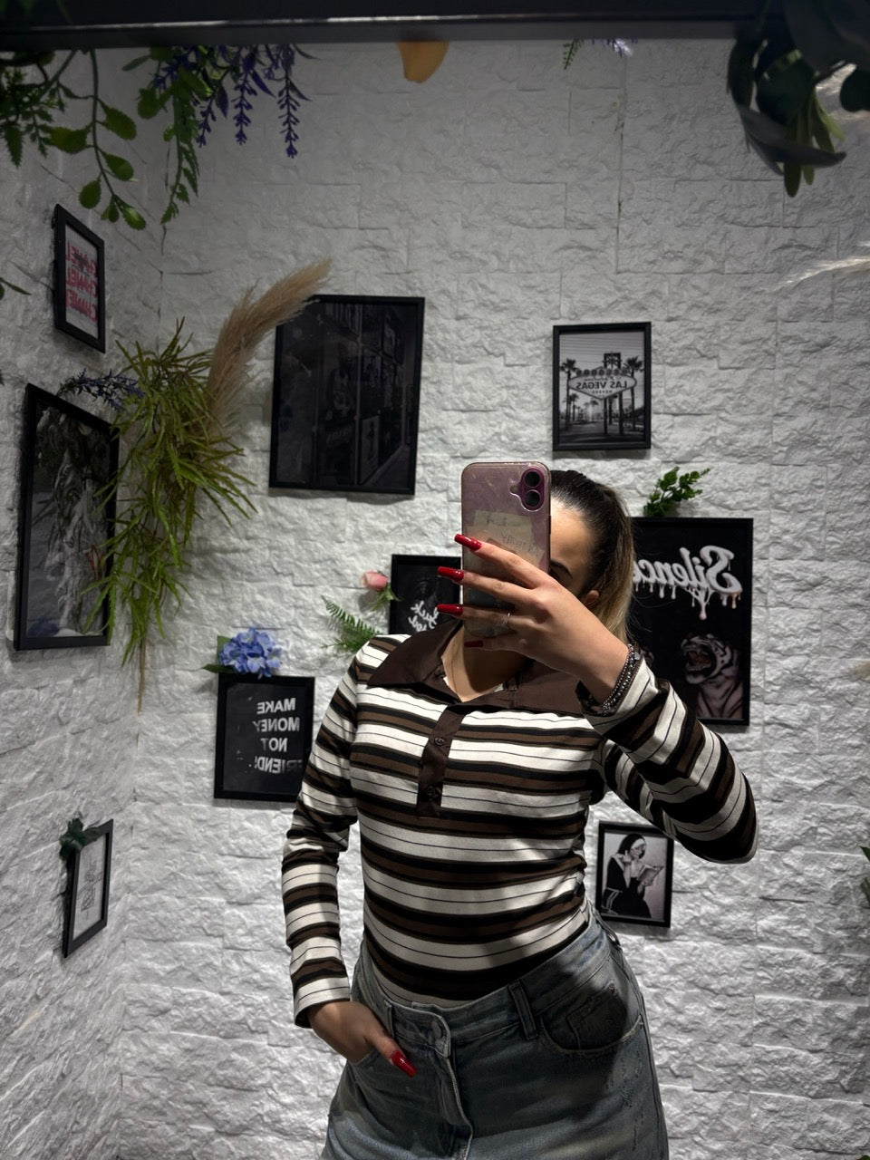 Maglia polo a righe con colletto e bottoni a manica lunga