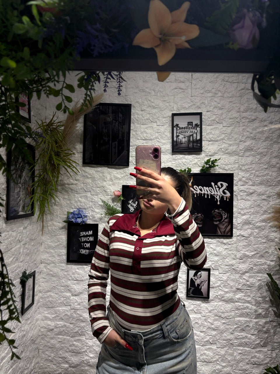 Maglia polo a righe con colletto e bottoni a manica lunga