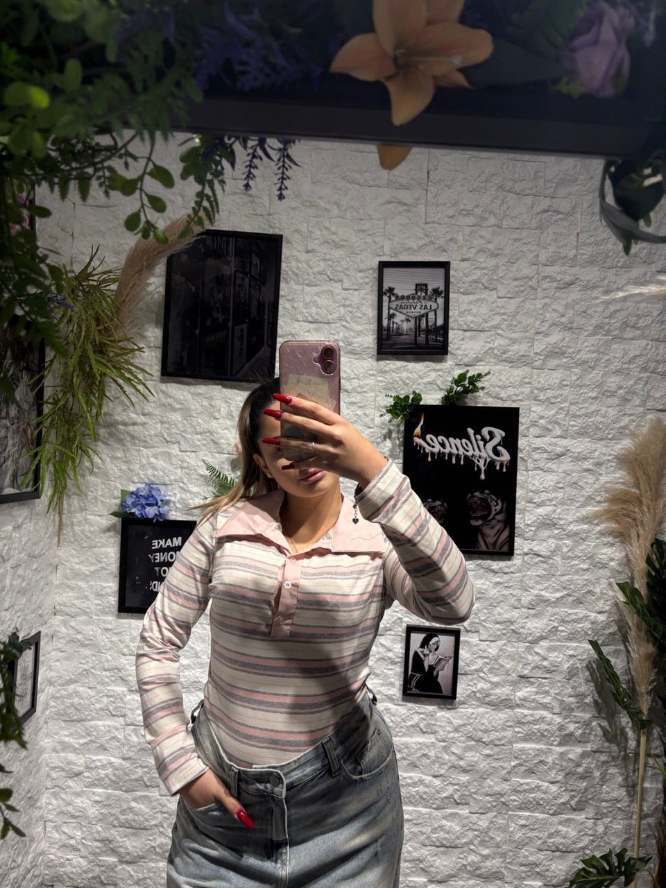 Maglia polo a righe con colletto e bottoni a manica lunga