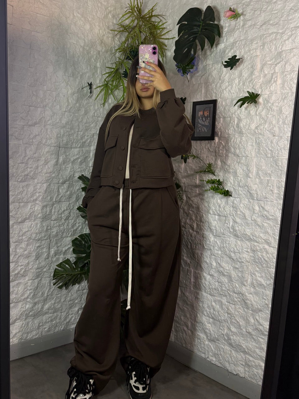 Completo in tuta con giacca college e pantalone palazzo