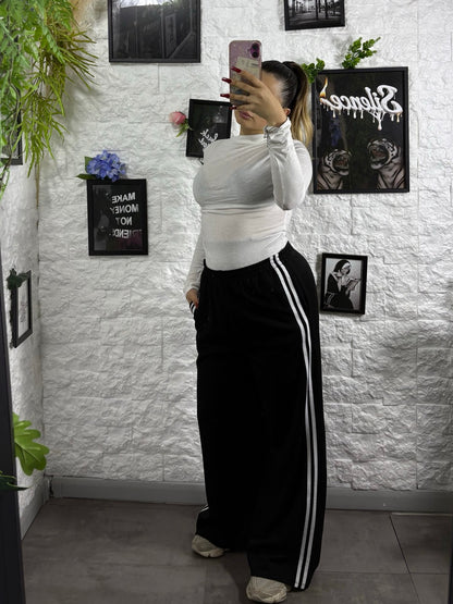 Pantalone a palazzo in tuta con riga laterale a contrasto