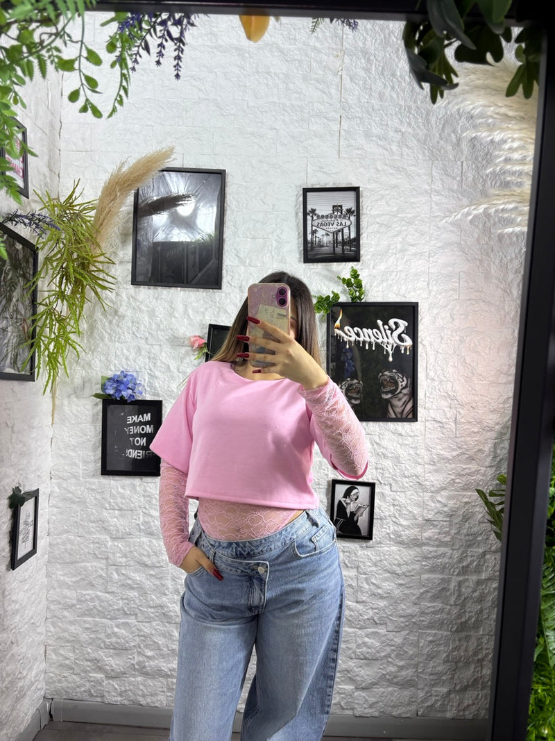 T-shirt aderente in tinta unita con maniche lunghe in pizzo