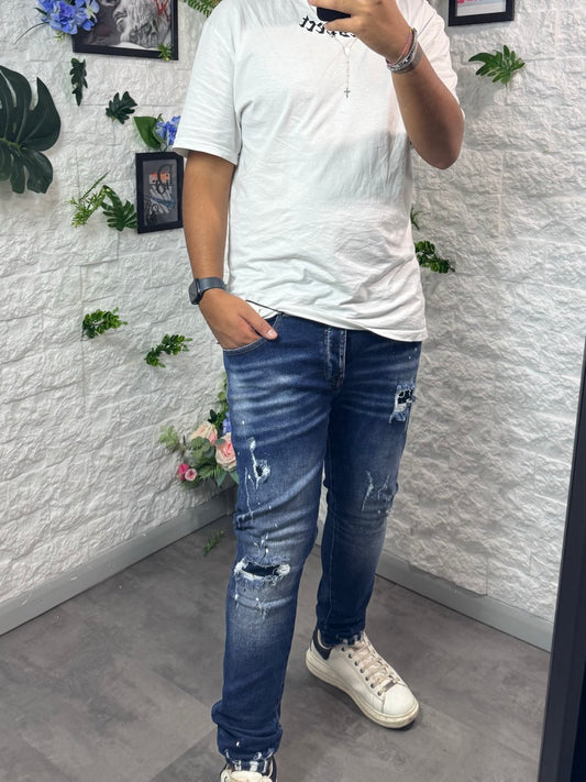 Jeans skinny blu con strappi e schizzi di vernice - MOD "DSQ"