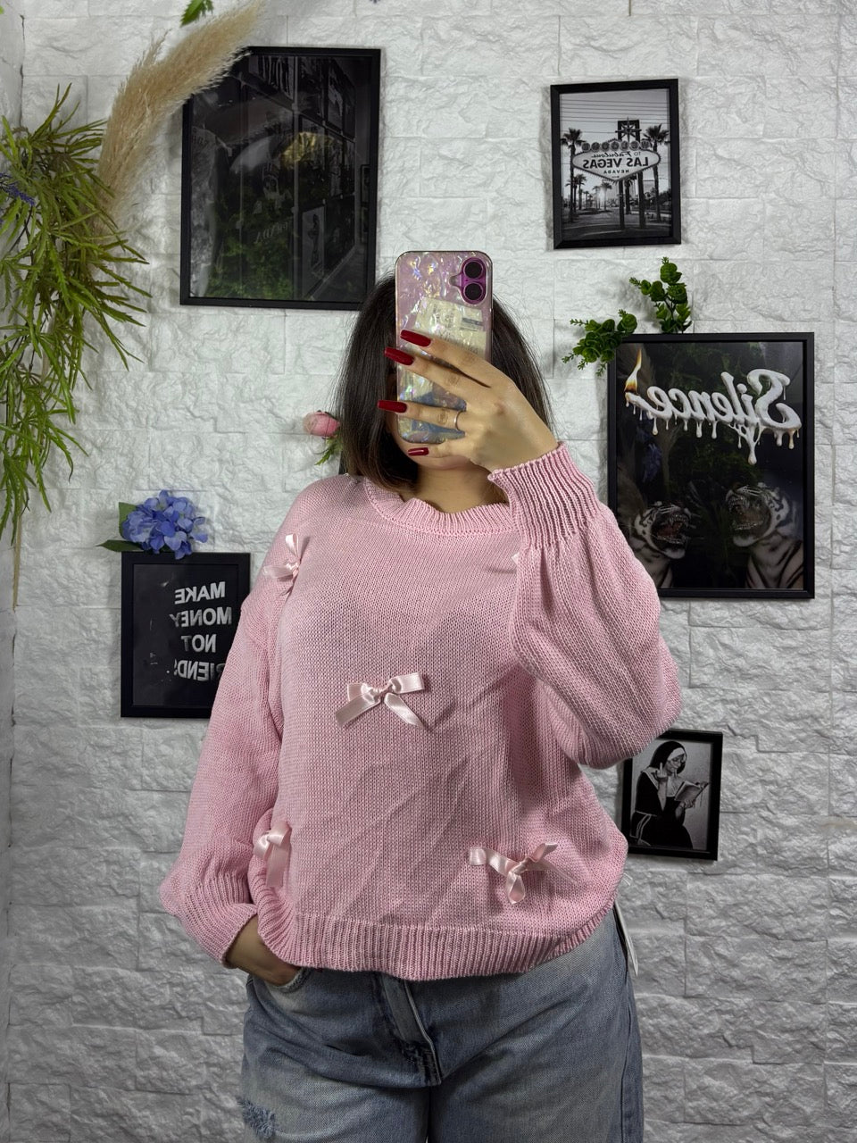 Maglioncino tinta unita con fiocchetti in raso applicati