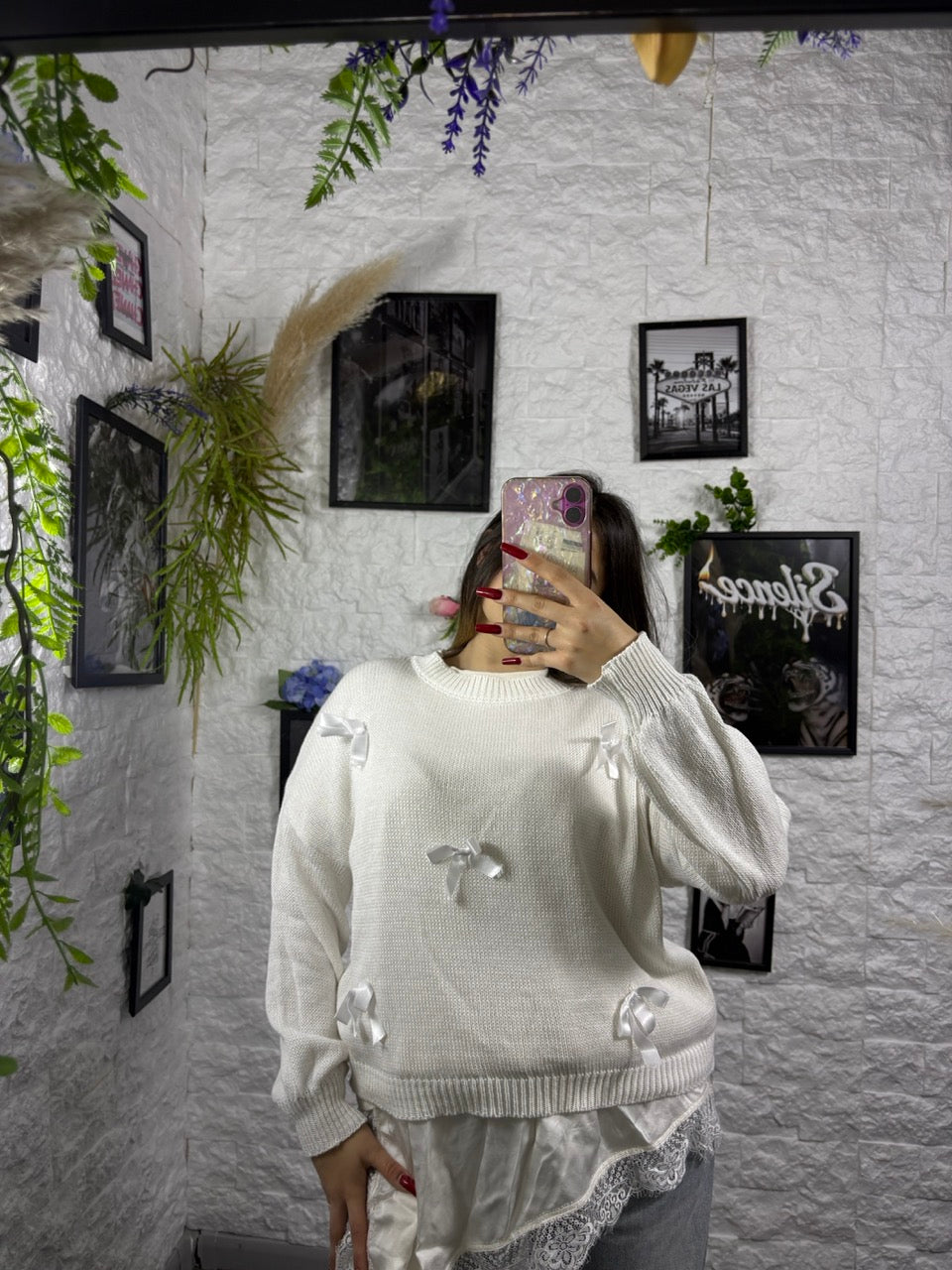 Maglioncino tinta unita con fiocchetti in raso applicati