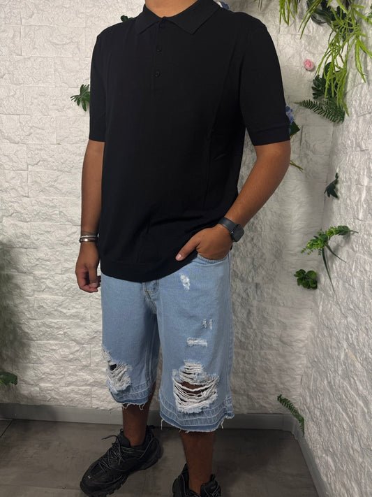 Jeans bermuda denim chiaro con strappi e fondo sfrangiato