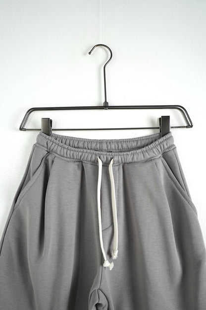 Pantaloncino in tuta grigio tinta unita 10-16 anni