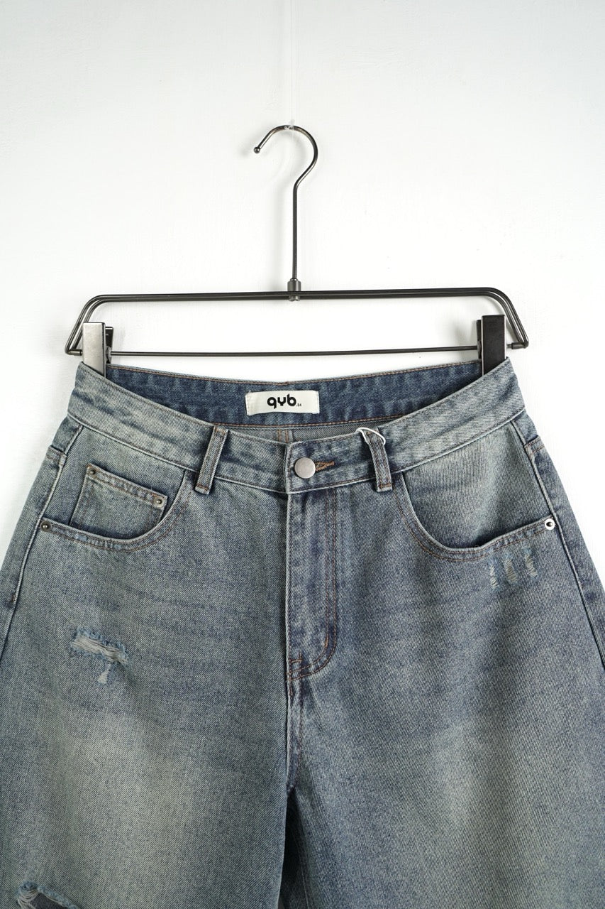 Jeans jort chiaro in denim con strappi