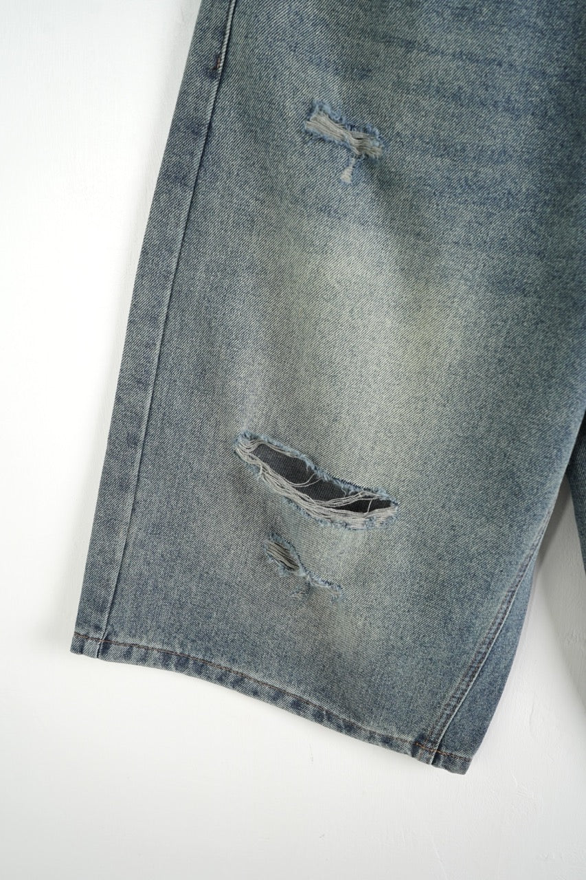 Jeans jort chiaro in denim con strappi