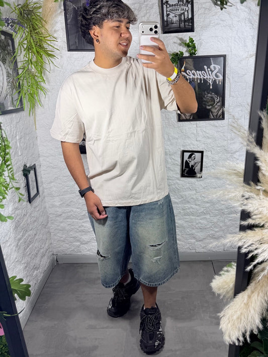 Jeans jort chiaro in denim con strappi