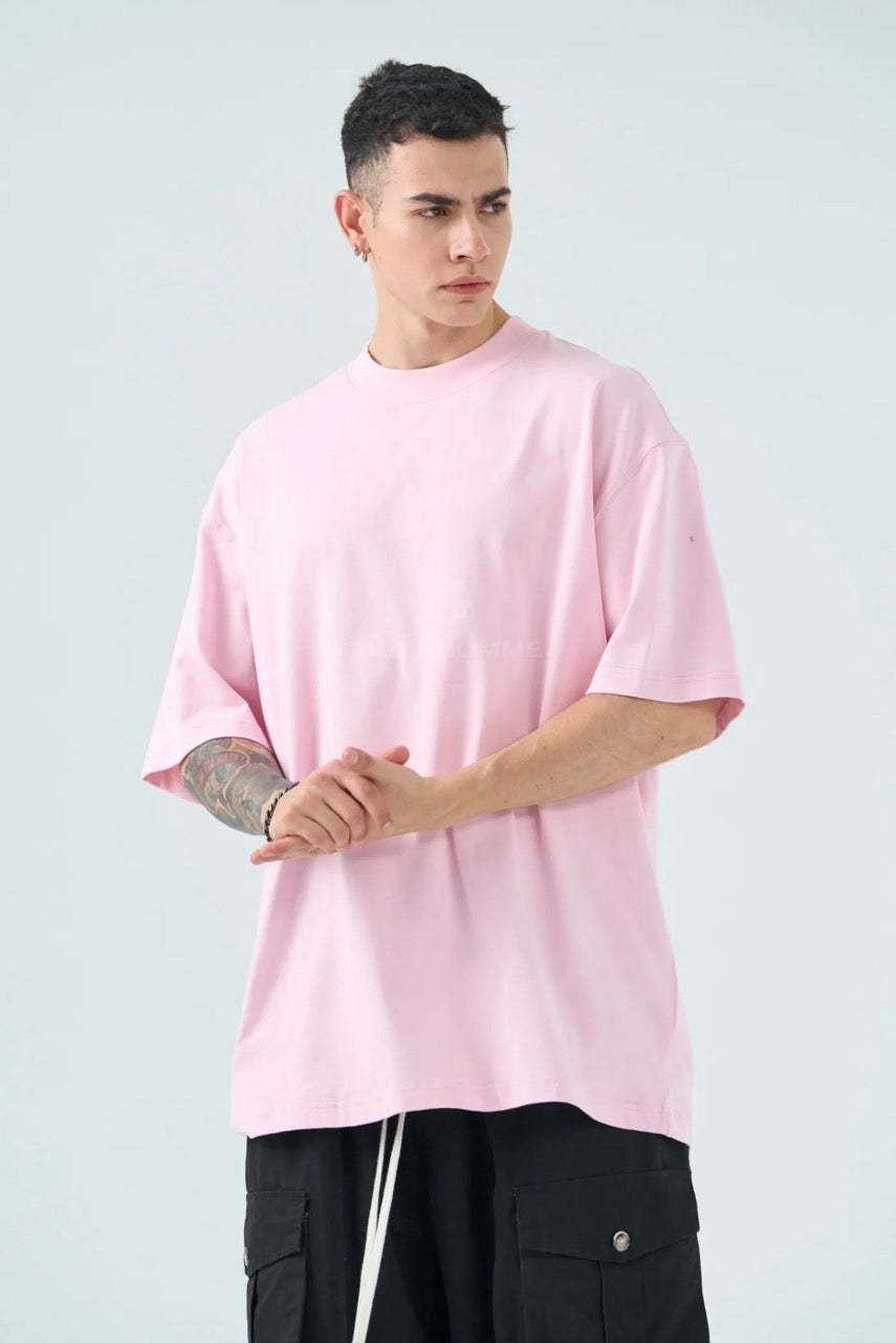 T-shirt rosa in tinta unita con mezzo collo alto - OVERSIZE