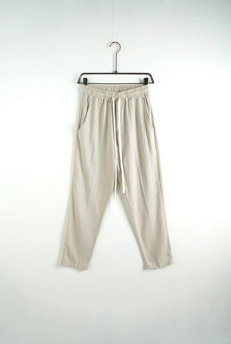 Pantalone beige in misto lino con elastico e laccio in vita