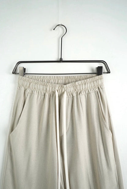 Pantalone beige in misto lino con elastico e laccio in vita
